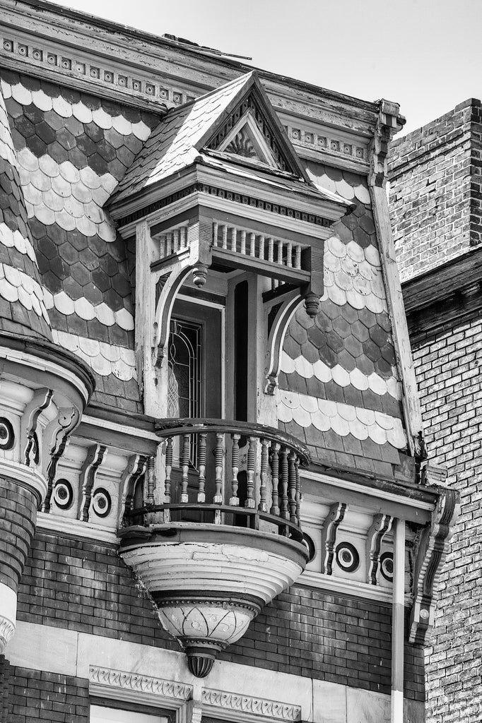 Black and white detail photograph of the beautiful and historic house built in 1889 for German immigrant Dr. Gregor Ackermann. Ackermann practiced medicine in his native Germany and then worked as a doctor for a German steamship company. In 1880 he came to Wheeling. He got married and had this home built at 2319 Chapline Street in 1889, which also served as his office as a physician and surgeon.