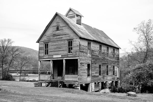 Black and white photograph of the old Hiwassee Meeting Hall, built in 1899 through the cooperation of a Church and the Masons. The church met on the first floor and the second floor served as the Masonic meeting hall. During the week, the first floor also doubled as a school.