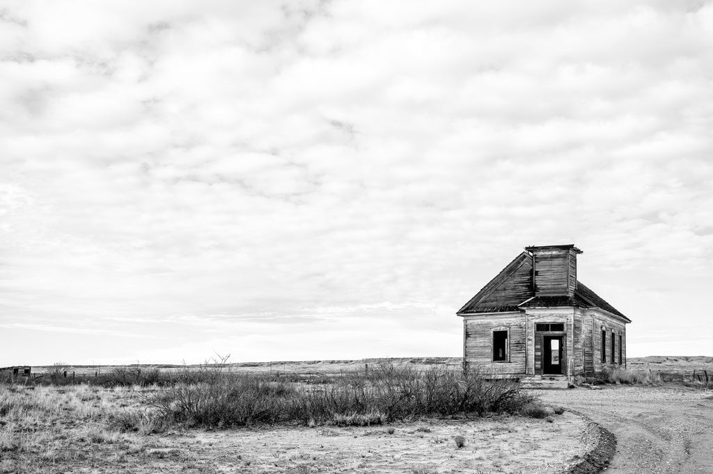 Black and white photograph of the old Taiban Presbyterian Church, built 1908 in Taiban, New Mexico. Active through the 1930s, the church has been unused and vacant since about 1960.