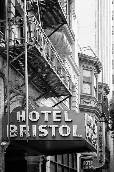 Black and white photograph of neon signs for the Hotel Bristol and Hotel Lindy, both of which have been in downtown Los Angeles since at least the 1920s.