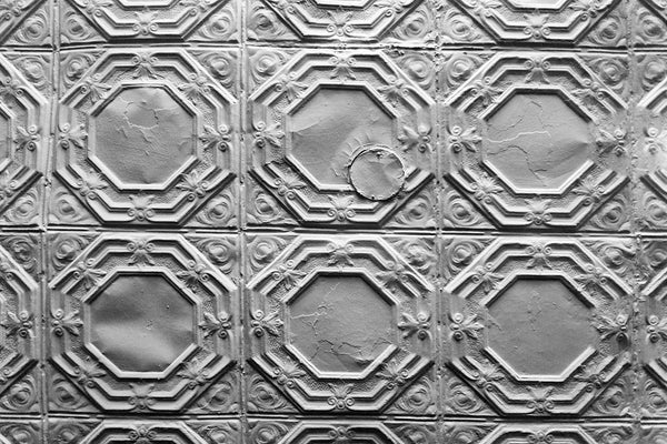 Black and white photograph of the pressed tin ceiling inside Ebenezer Baptist Church in Atlanta, where Martin Luther King gave sermons.