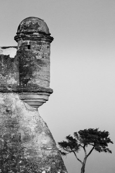 Black and white photograph of The Castillo de San Marcos in St. Augustine, the oldest existing masonry fort in the United States, built in the late 1600s on the shore of Matanzas Bay.