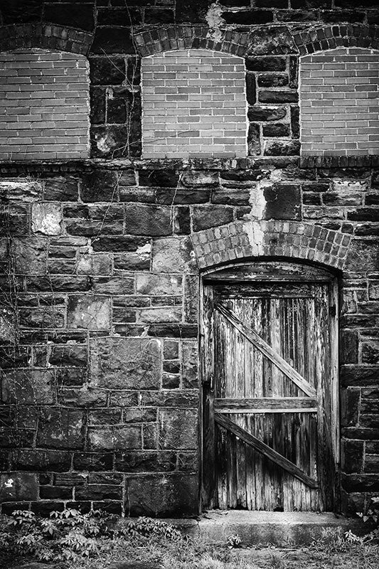 Black and white photograph of an abandoned industrial building located near Sloss Furnaces in downtown Birmingham, Alabama.