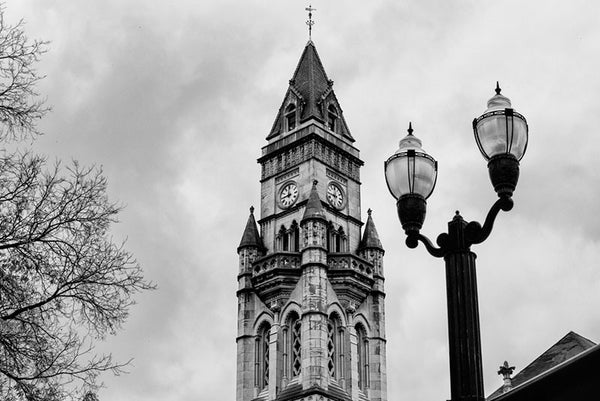 Black and white photograph of one of Nashville's most visible architectural landmarks, the Customs House on Broadway. Approved for construction in 1856, it was delayed by the outbreak of the US Civil War, with the cornerstone finally laid by President Rutherford B. Hayes in 1877. Designed in the Victorian Gothic style, the Customs House was a Federal courthouse, customs house, and post office.