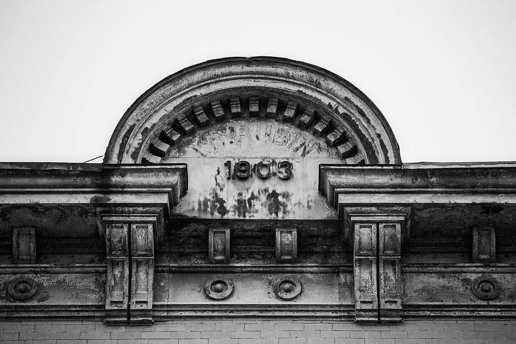 Black and white photograph of the roofline of the LH Rubin Building in Charleston, South Carolina.