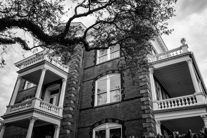 Black and white photograph of Calhoun Mansion, one of the largest of the grand old southern mansions in Charleston, South Carolina. 