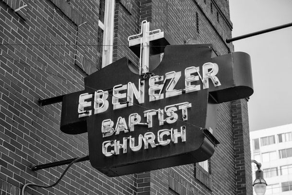 Black and white photograph of the sign for Martin Luther King's historic Ebenezer Baptist Church in Atlanta.