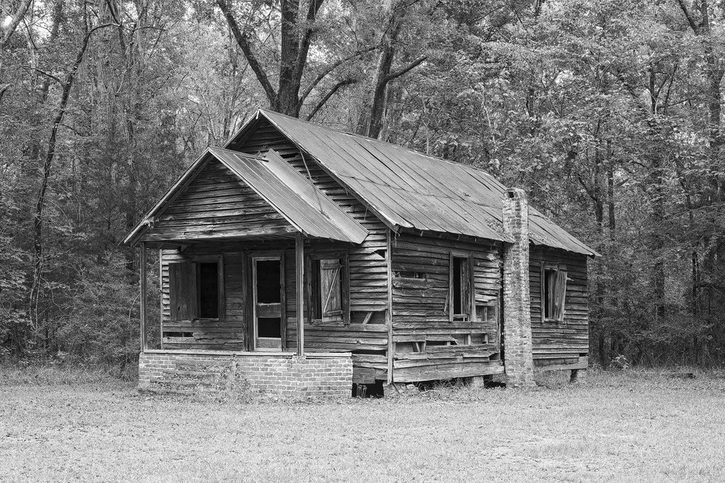 Black and White Photograph of an Abandoned Old Wooden Schoolhouse