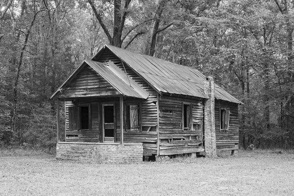 Black and White Photograph of an Abandoned Old Wooden Schoolhouse