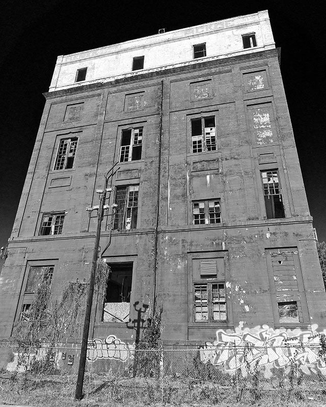 Black and white photograph for sale of an abandoned industrial building