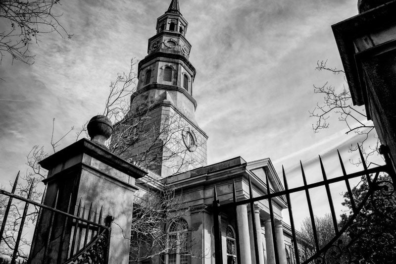Black and white photograph of the historic St. Philips Episcopal Church in the French Quarter of Charleston.