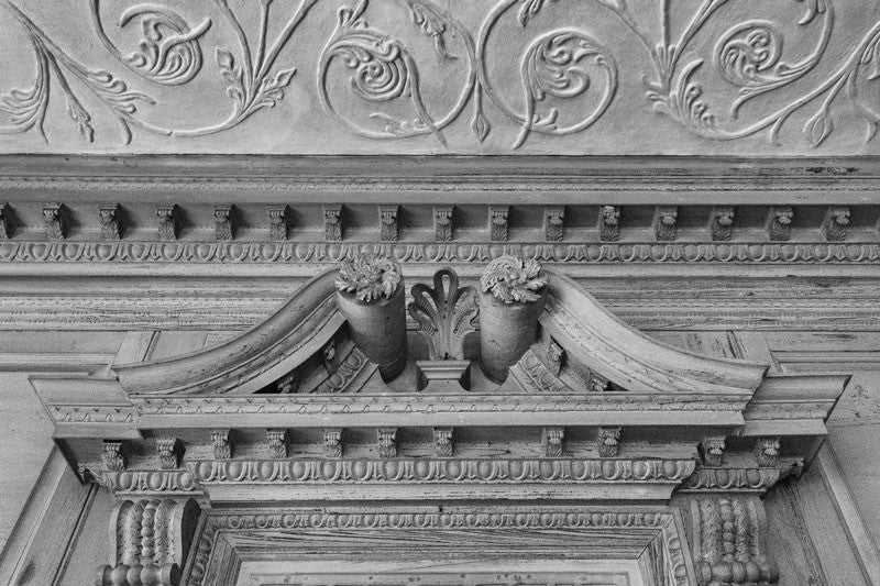 Black and white architectural detail photograph of Drayton Hall's elaborate interior woodwork and ornate plaster ceilings. NOTE: If you're interested in purchasing this photograph, be sure to examine the detail photograph. This image was made in dark conditions, which means there is a lot of film grain in the details.