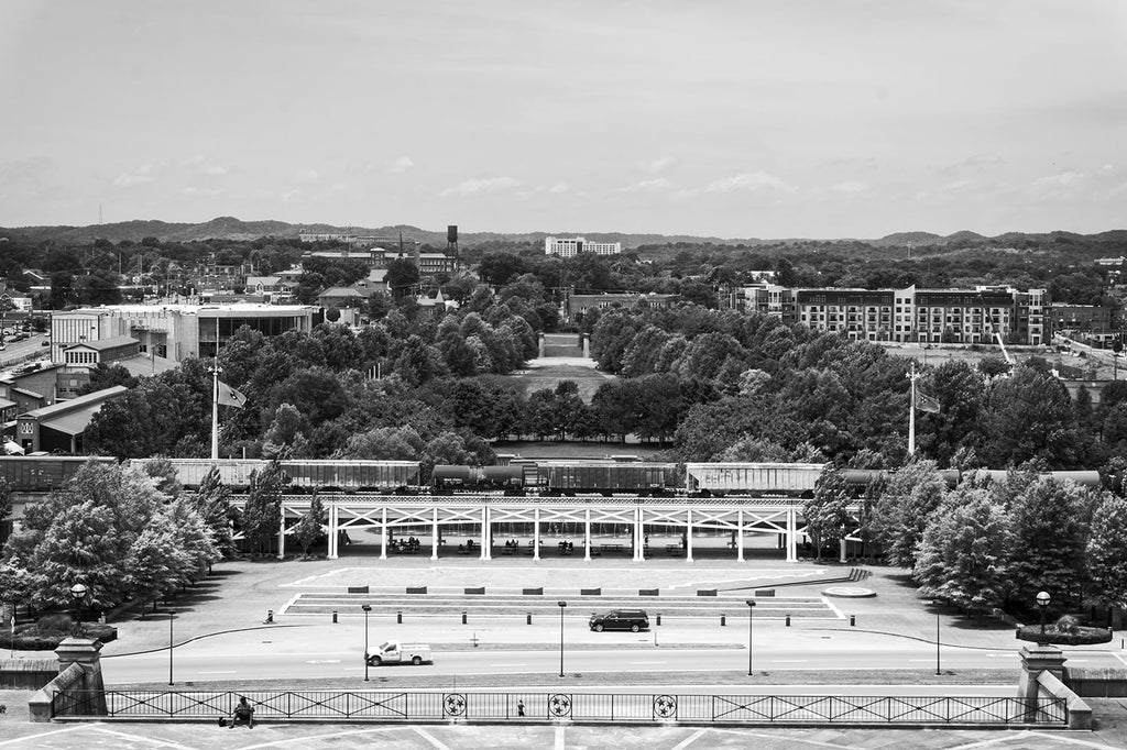 Black and white photograph of Bicentennial Mall and the Germantown neighborhood in Nashville, Tennessee. This vista is seen from the vantage point of the hilltop state capitol building.
