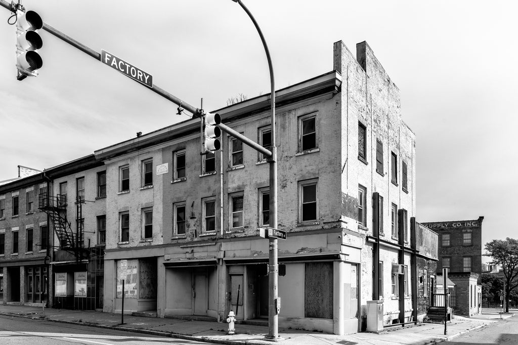 Black and white photograph of the historic Teoronto Hall - Smiths Block building that's located across the street from the Kodak tower in Rochester. It was built starting in 1844.