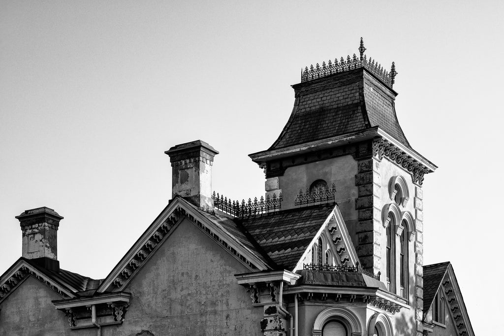 Black and white photograph of a historic ornate Victorian mansion on Millionaire Row in Danville, Virginia.
