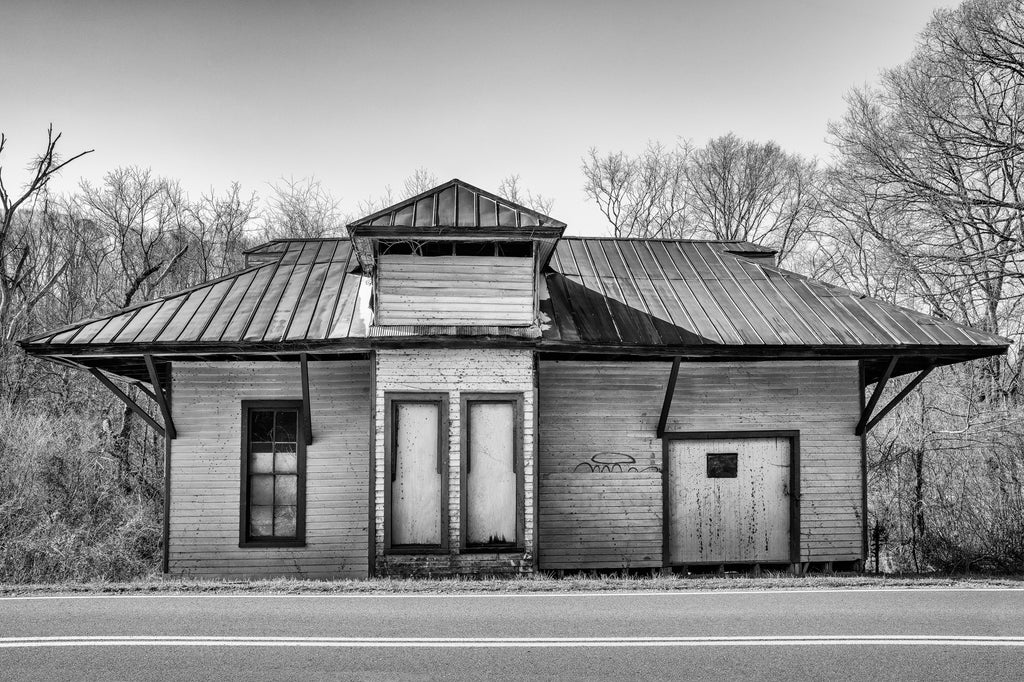 Black and white photograph of the old McKnight Train Depot, which served the Middle Tennessee Railroad in Maury County from 1910 until 1927, when the train tracks were replaced by the road.