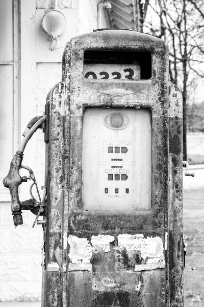 Fine art photograph of a rusty old Esso gasoline pump at an abandoned country store found along a back road. The fuel price was frozen at 33 cents, which occurred in 1967.