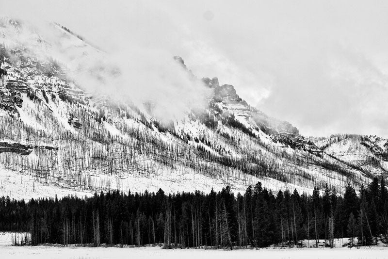 Black and white landscape photograph of Wyoming's Beartooth Mountains in winter.