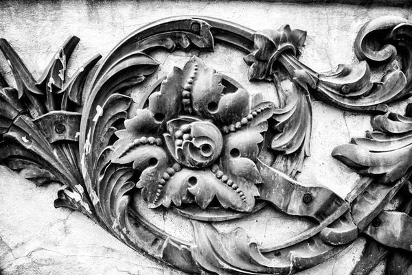 Black and white photograph of a concrete monument to the USS Tennessee (later renamed the "Memphis"), an armored cruiser launched in 1904. The monument, located in Nashville's Centennial Park, features the actual bronze scrollwork from her bow, which was removed from the ship in 1909. The Memphis wrecked in 1916 and was sold for scrap in 1917. The name "USS Tennessee" was reassigned to a battleship.