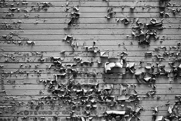 Black and white photograph of peeling paint in the arcade area in downtown Nashville, Tennessee.