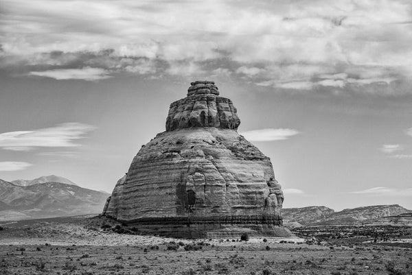 Black and white landscape photograph of an unusual dome rock outcropping in the desert of Utah known as Church Rock.