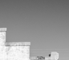 Abandoned Building in Carrizozo, New Mexico with a UFO in Sky - Black and White Photograph (KD008544XA)