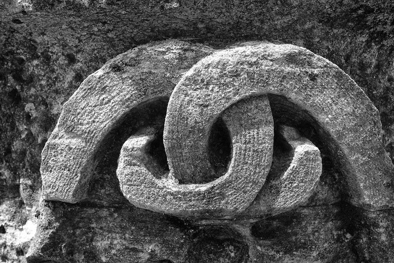 Black and white photograph of a classical Greek column fragment from the original Tennessee State Capitol building in Nashville, Tennessee. These pieces of classically-inspired columns have been scattered around Nashville as a reminder of its reputation as "the Athens of the South."