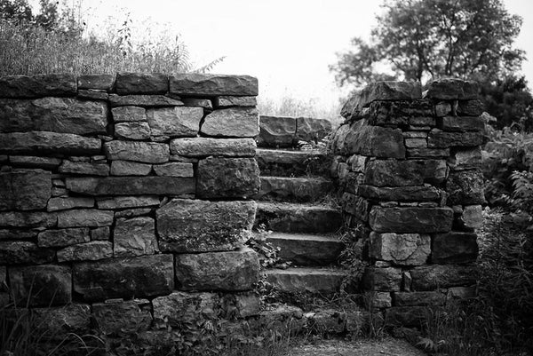 Black and white photograph of the old limestone walls with steps at Fort Negley near Nashville. Fort Negley is a star-shaped structure built of limestone blocks on a hilltop south of the city, and was the largest inland fort built during the American Civil War. The fort was built by the Union army in 1862 as a defensive post after the Confederates lost control of Nashville in successive battles, but with fighting concentrated in other areas, the fort never saw action.