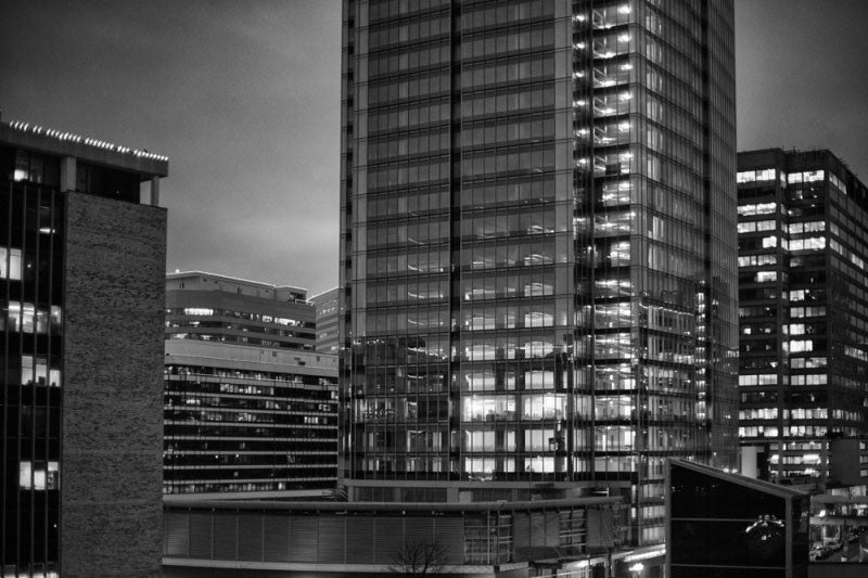 Black and white photograph of office tower lights at twilight in Arlington, Virginia, just across the river from Washington, D.C.