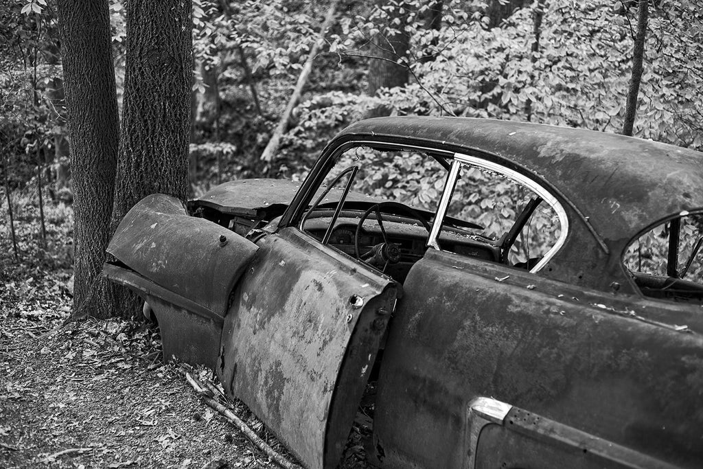 The story behind a very old wrecked car found in the forest