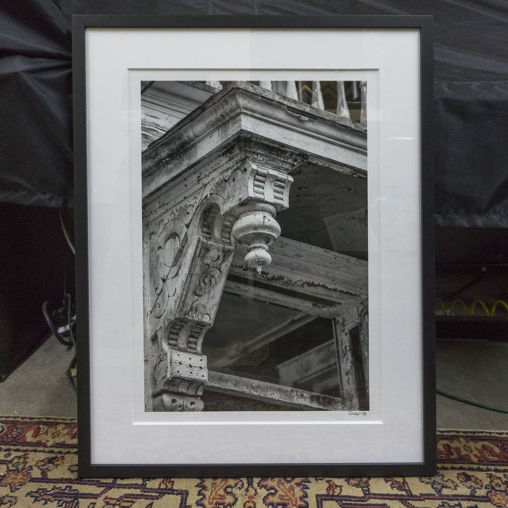 Six black and white photographs of Charleston professionally framed