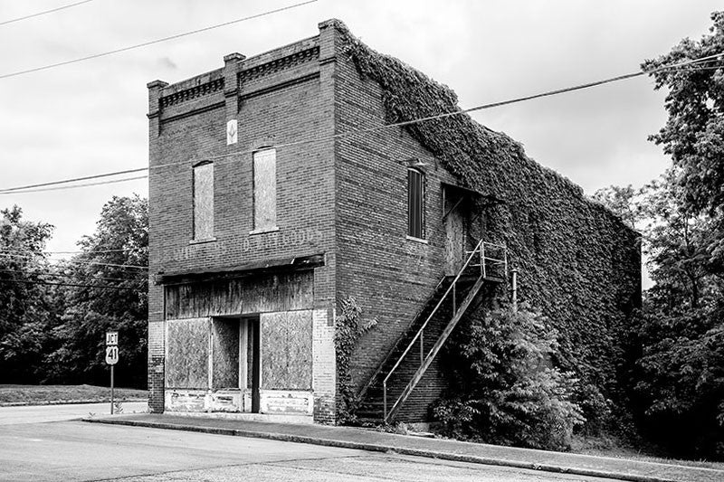 Black and white photographs of abandoned downtown Adams, Tennessee