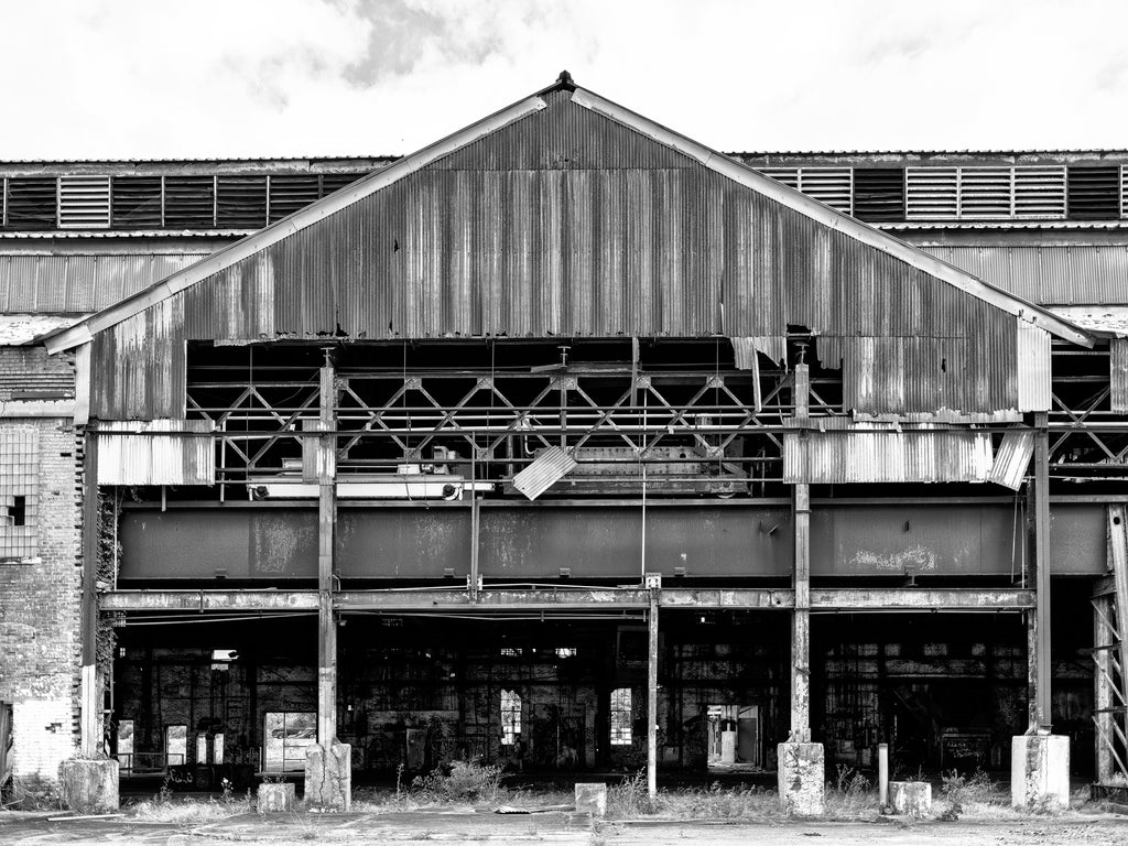 Black and white medium format photograph of the exterior of Chattanooga's massive abandoned Wheland Foundry, last used by industry in 2003.