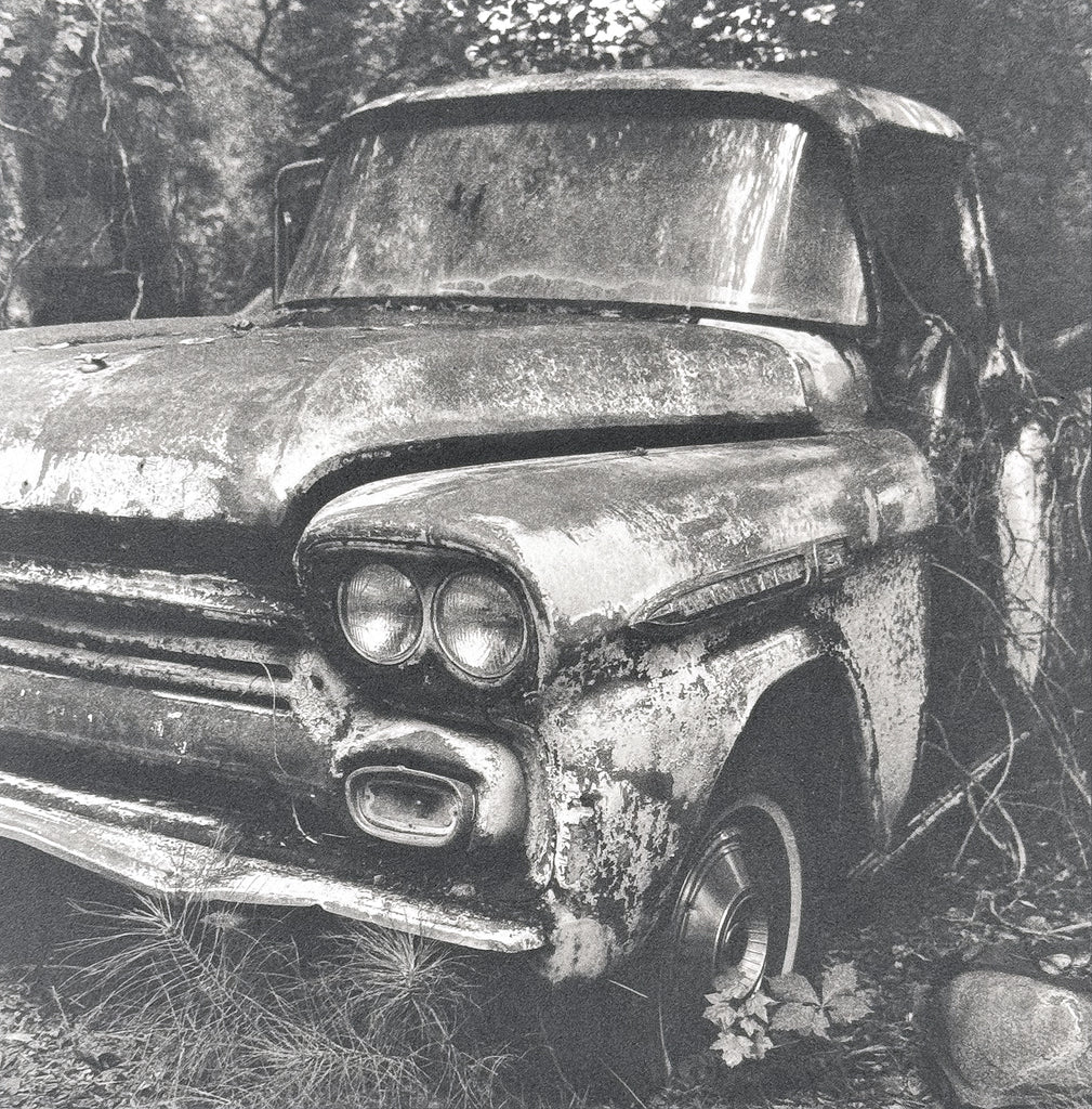 One-of-a-kind, handmade platinum/palladium print showing a rusty old pickup truck abandoned in the woods of the American South. Limited to an edition of 8 at this size plus two artist proofs, the price will increase with each sale.

Each print of the edition will be a unique, handmade print that may vary slightly from the first print shown here.&nbsp;Because of the handmade nature of the printing process, every print&nbsp;— even those made from the identical negative&nbsp;— is unique.