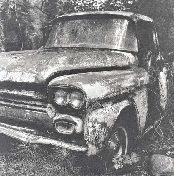 One-of-a-kind, handmade platinum/palladium print showing a rusty old pickup truck abandoned in the woods of the American South. Limited to an edition of 8 at this size plus two artist proofs, the price will increase with each sale.

Each print of the edition will be a unique, handmade print that may vary slightly from the first print shown here.&nbsp;Because of the handmade nature of the printing process, every print&nbsp;— even those made from the identical negative&nbsp;— is unique.