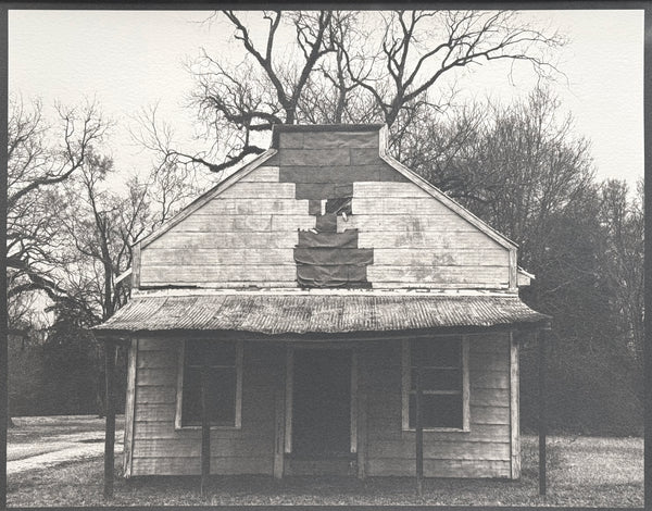 One-of-a-kind, handmade platinum/palladium print by Keith Dotson showing an abandoned storefront in Newbern, Alabama. Limited to an edition of 8.