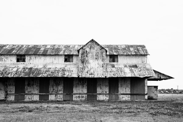 Black and white photograph of an old cotton gin in the heart of the Mississippi Delta.