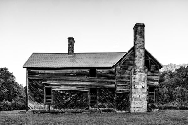 Black and white photograph of the historic abandoned 1890s Jimmy Davis Homestead now under state protection on the parkland at Dog Cove, near Sparta, Tennessee.