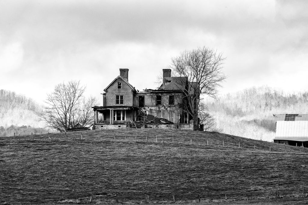 Black and white photograph of the collapsing ruins of the historic Preston-Morgan House on a hilltop in rural Seven Mile Ford, Virginia.