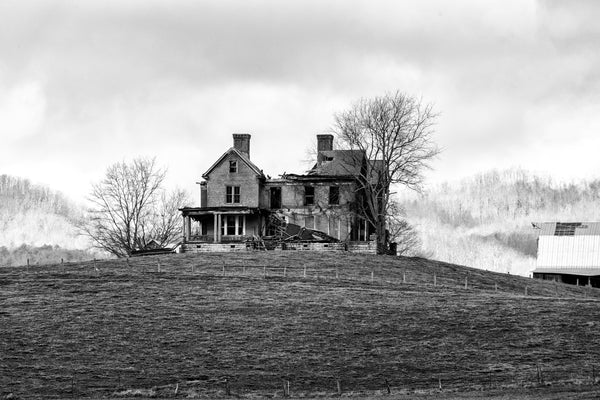 Black and white photograph of the collapsing ruins of the historic Preston-Morgan House on a hilltop in rural Seven Mile Ford, Virginia.