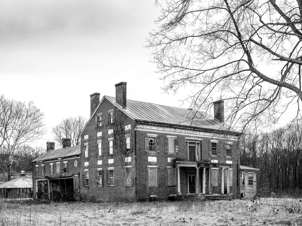 Black and white photograph of the historic John Preston House, also called the Preston-Crockett House or Herondon. Whichever name one chooses, the house represents fascinating and controversial history. The house was built in 1842, to serve as a tavern and inn on the old Wilderness Road, replacing an older and smaller log tavern that had developed a shady reputation. The former innkeeper was suspected of taking advantage of unwary travelers, even to the point of possibly robbing and murdering some of them. 