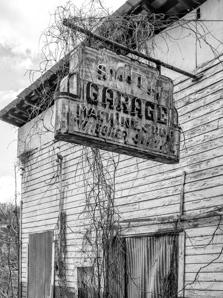 Abandoned Small Town Garage with Rusty Neon Sign - Black and White Photograph (KDX1516X)