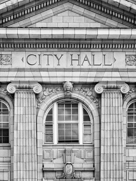 Black and white photograph of the historic 1916 City Hall building in downtown Little Falls, New York.
