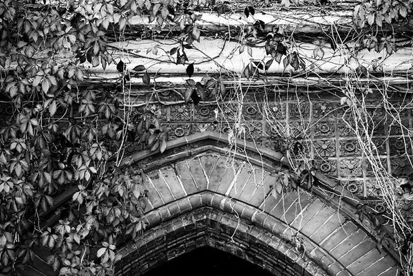 Black and white photograph of an arch on the front of Louisville's historic and abandoned 1860s Quinn Chapel.