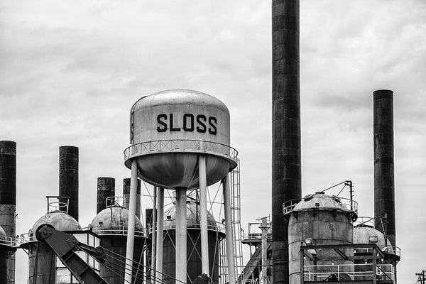 Black and white photograph of the water tower at Birmingham's historic Sloss Furnaces.