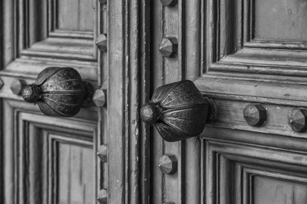 Black and white photograph of historic church doors in St. Augustine, Florida