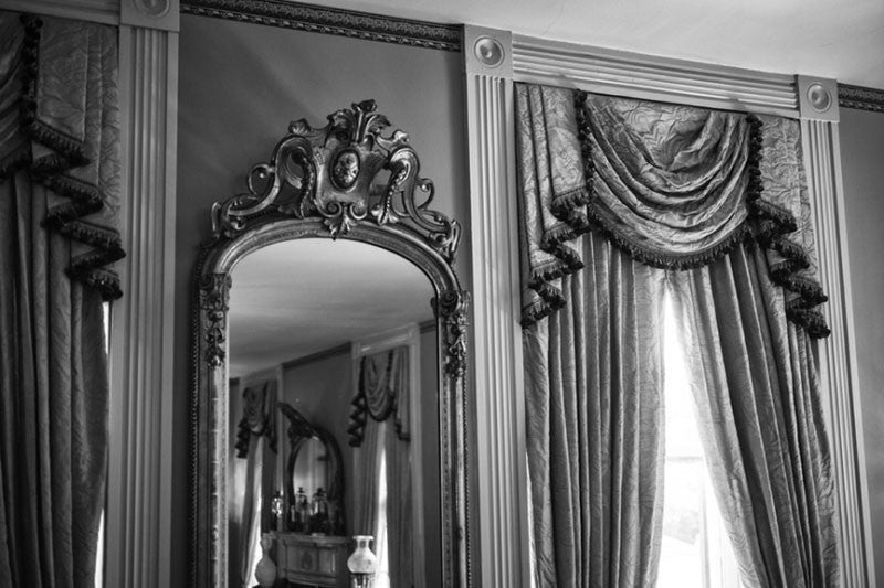 Black and white architectural interior photograph of the lavish decor inside Birmingham's historic Arlington House.