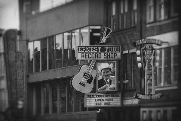 Black and white photograph of Nashville's Lower Broadway honky tonk district.