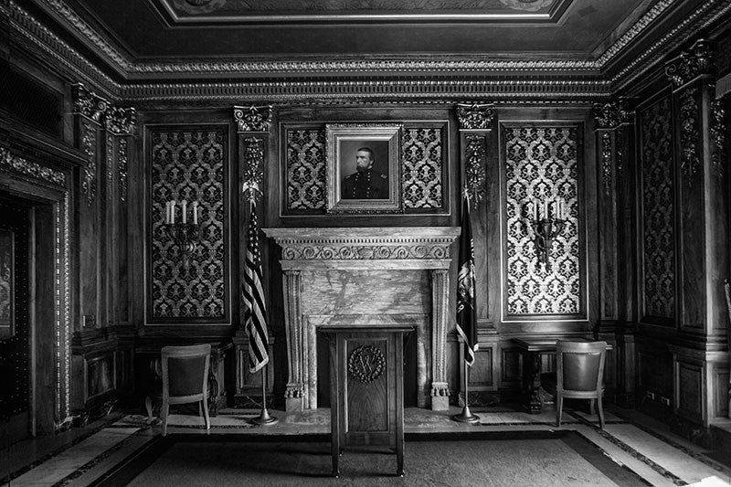 Black and white photograph of a highly ornate and historic meeting room inside the Wisconsin state capitol in Madison, Wisconsin.
