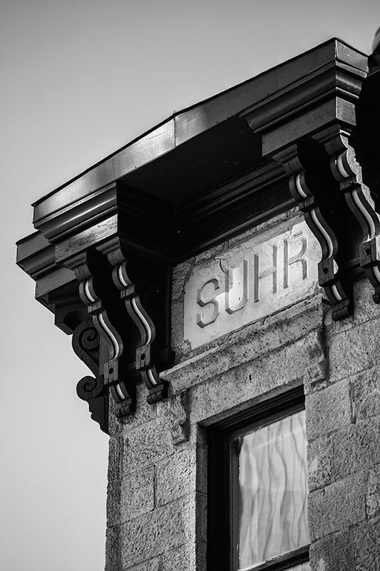 Black and white photograph of the 1887 Suhr Bank Building in downtown Madison, Wisconsin.